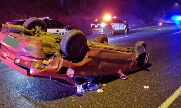 Armed, convicted felon flips car after being chased through White Center