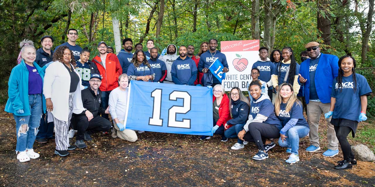 Members of Seahawks Super Bowl championship team help kick off ‘Back to Action’ campaign for local food banks, including in White Center