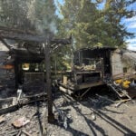 Travel trailer fire spreads to two homes in White Center area Saturday
