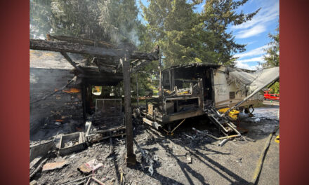 Travel trailer fire spreads to two homes in White Center area Saturday